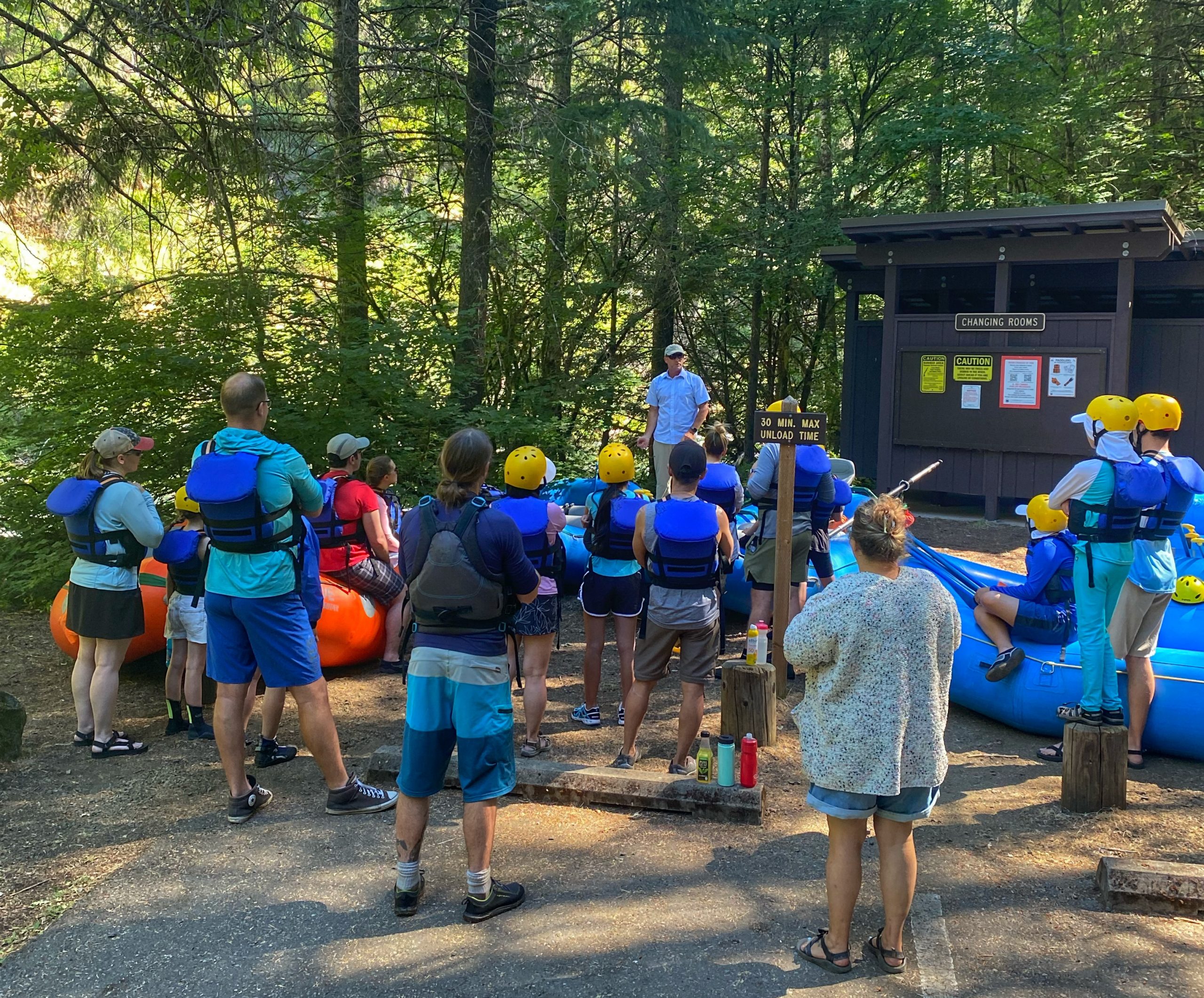 Large group of rafters receiving a safety talk prior to departure!