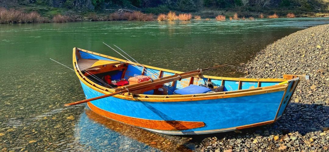 wooden drift boat on the banks of the North Umpqua rover in Oregon